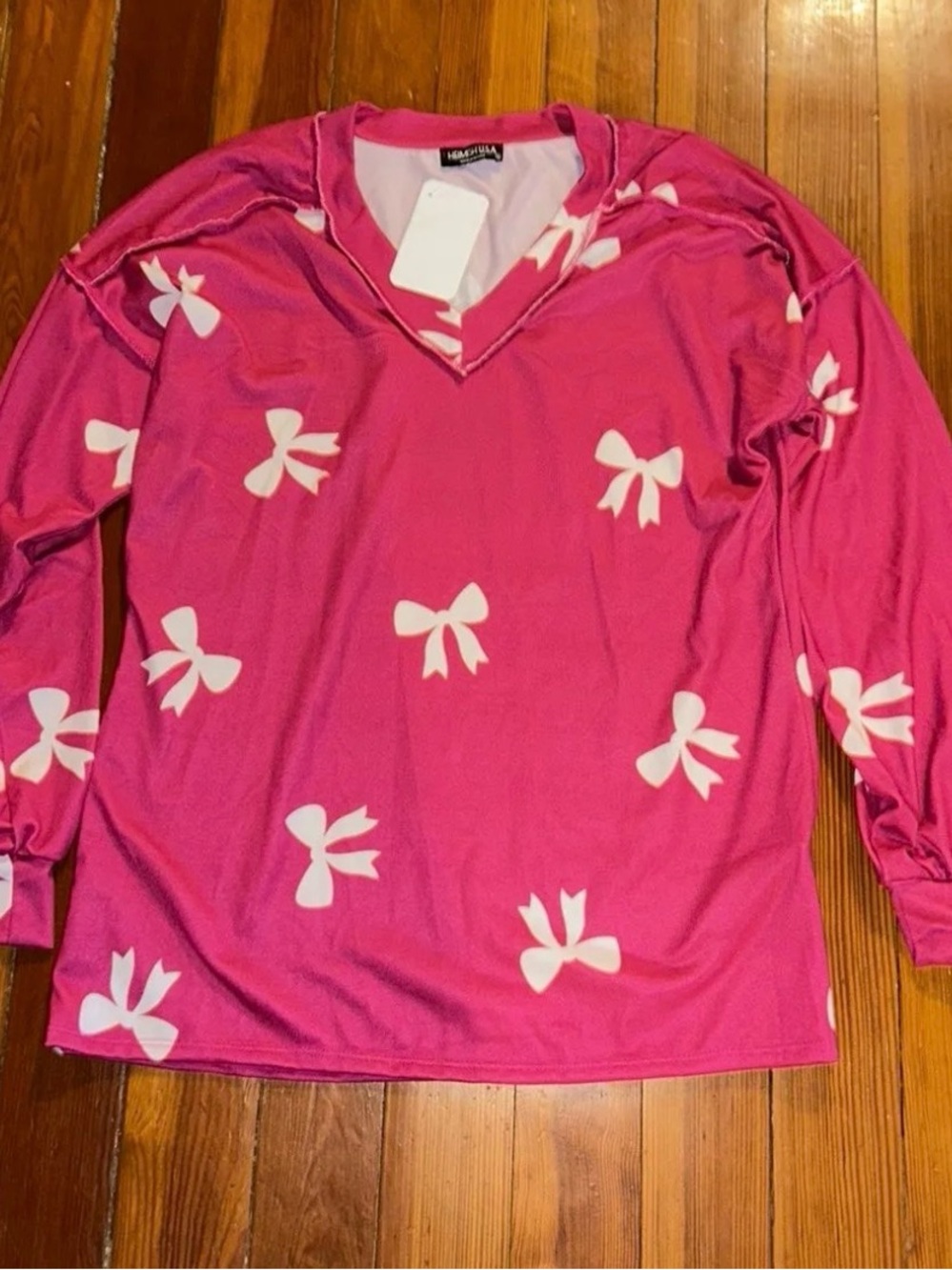 HEIMISH USA Pink Long-Sleeve Top with White Bow Print (can fit larger)